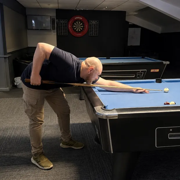 Tom lining up a shot at the club